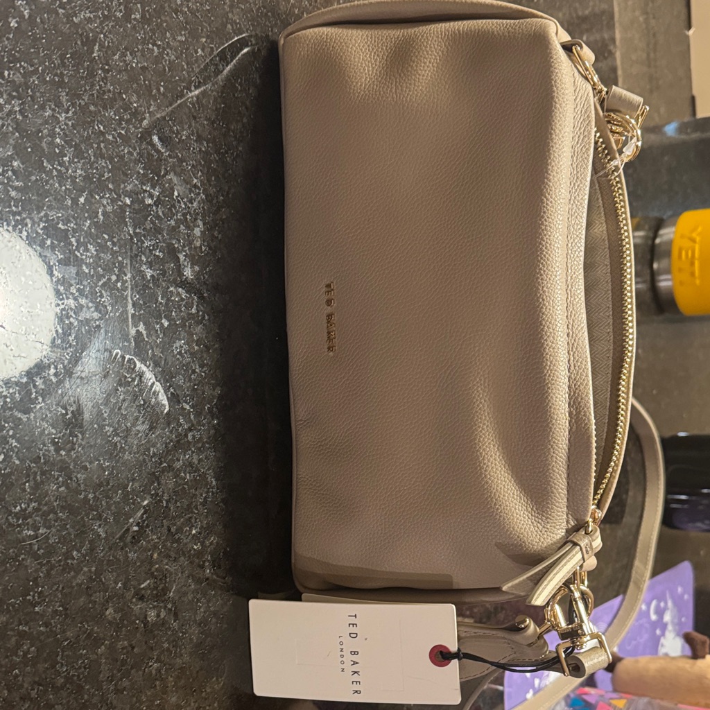 Ted Baker Beige Wristlet With Gold Accents